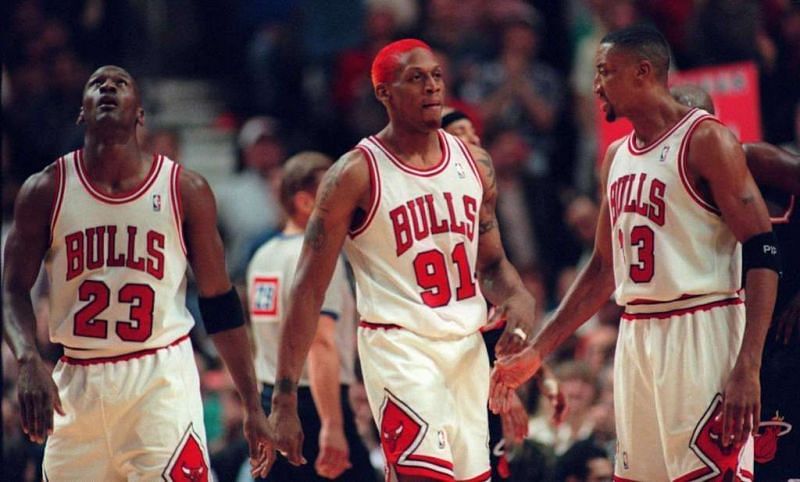 Dennis Rodman (#91) with Michael Jordan &amp; Scottie Pippen of the Chicago Bulls [Source: Illinois Gordon]