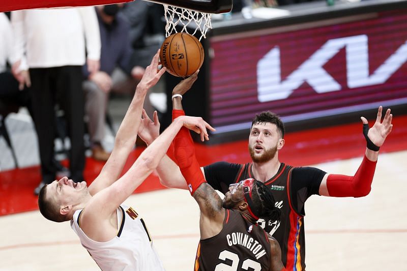 Nikola Jokic attempts to block a shot.