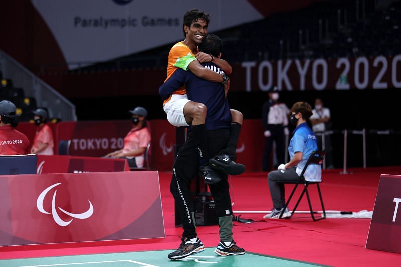 Pramod Bhagat celebrates after winning the gold at the Tokyo Paralympics.