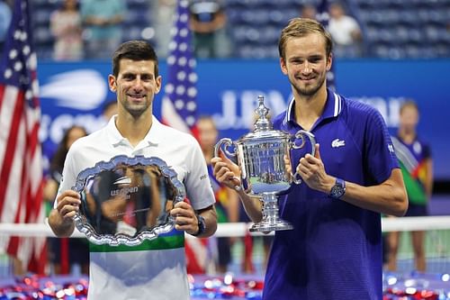 Novak Djokovic (L) and Daniil Medvedev at the US Open 2021 trophy presentation