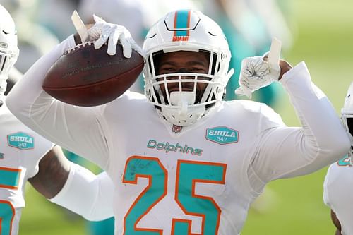 Miami Dolphins cornerback Xavien Howard celebrating an interception