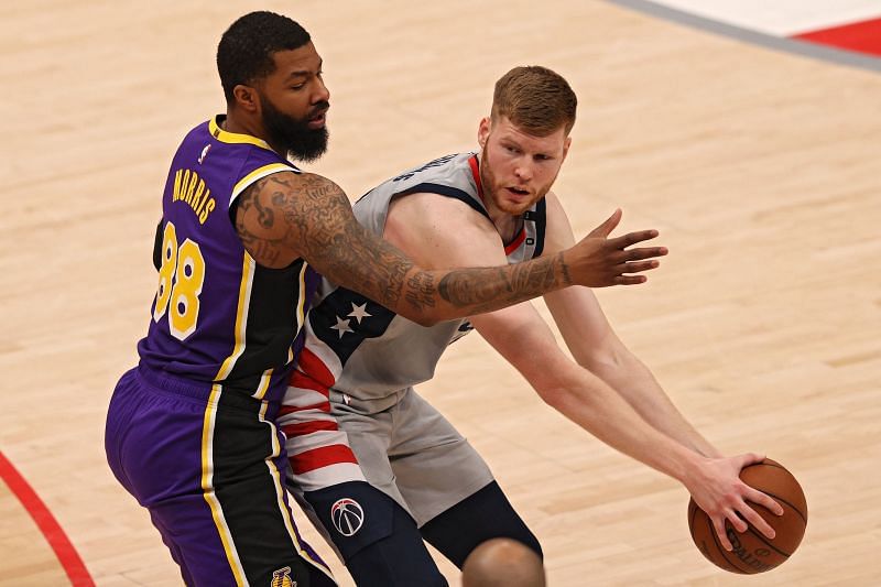 Davis Bertans of the Washington Wizards is guarded by Markieff Morris #88