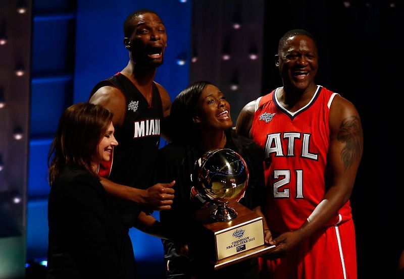 Chris Bosh #1 of the Miami Heat and the Eastern Conference celebrates with NBA Legend Dominique Wilkins and Swin Cash #32 of the New York Liberty after winning the Degree Shooting Stars Competition as part of the 2015 NBA Allstar Weekend at Barclays Center on February 14, 2015 in the Brooklyn borough of New York City.