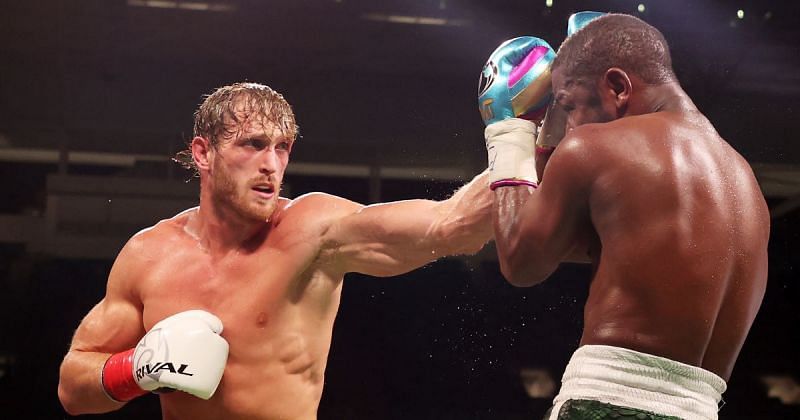 Logan Paul (left) in action against Floyd Mayweather (right)