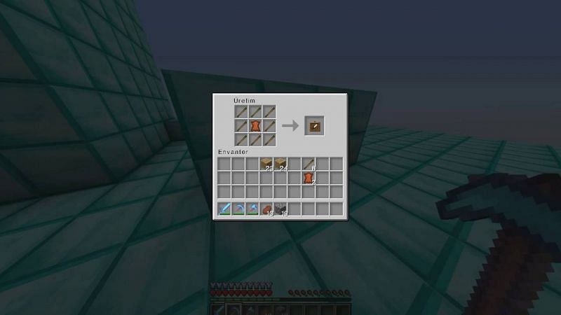 Crafting an item frame (Image via Minecraft)