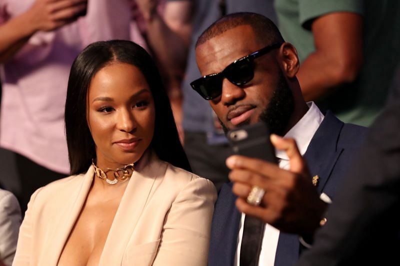 Lebron James and his wife Savannah Brinson attend the super welterweight boxing match