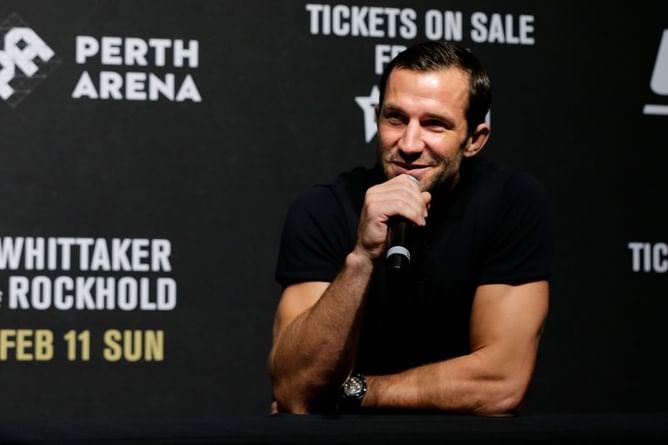 Luke Rockhold claims no one on the UFC roster "has enough balls" to raise the issue of fighter pay