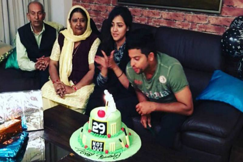 Suresh Raina at his 29th birthday with his wife and his parents