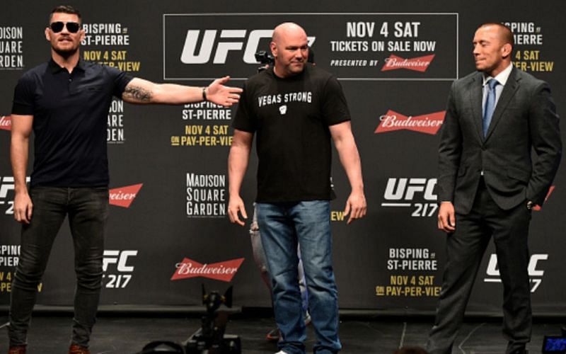 Michael Bisping (left); Dana White (center); Georges St-Pierre (right)