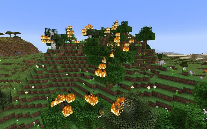 A small forest fire in action (Image via Minecraft)