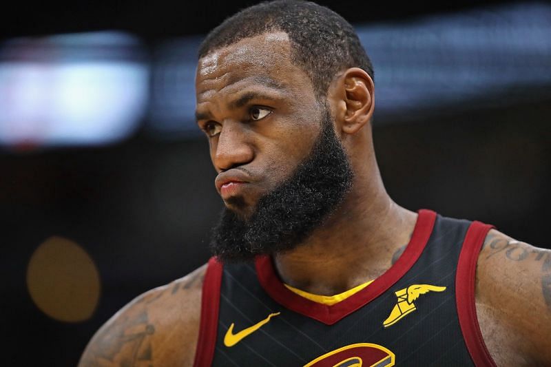 LeBron James #23 of the Cleveland Cavaliers listens to a coach during the second half against the Chicago Bulls at the United Center on March 17, 2018 in Chicago, Illinois. The Cavaliers defeated the Bulls 114-109.