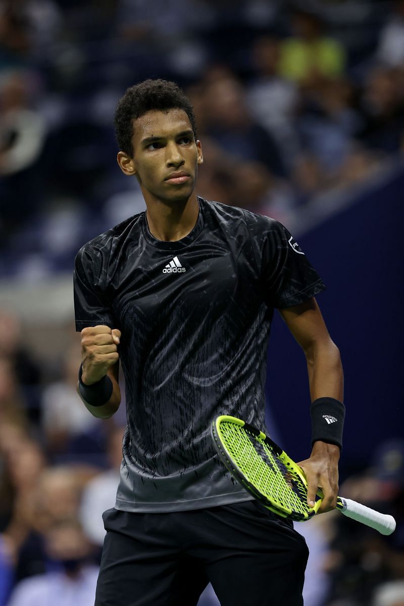 Felix Auger-Aliassime in action against Carlos Alcaraz in the quarterfinals of US Open 2021
