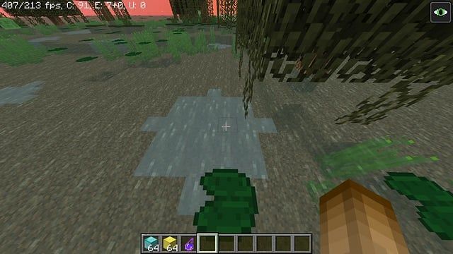 Lots of clay chunks in a swamp lake (Image via Mojang)