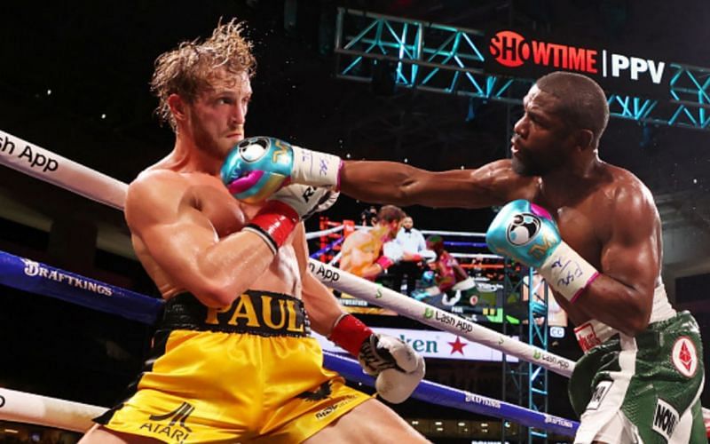 Logan Paul (left) went the distance with Floyd Mayweather (right)