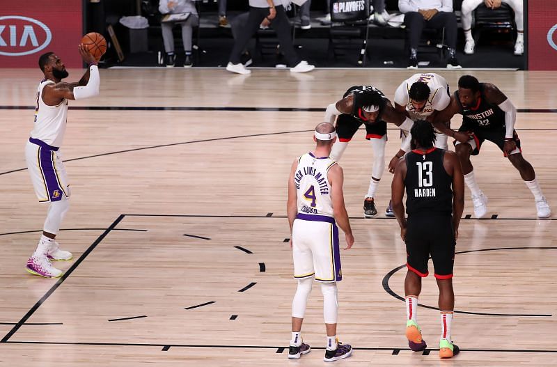 LeBron James shoots the ball during an NBA game.