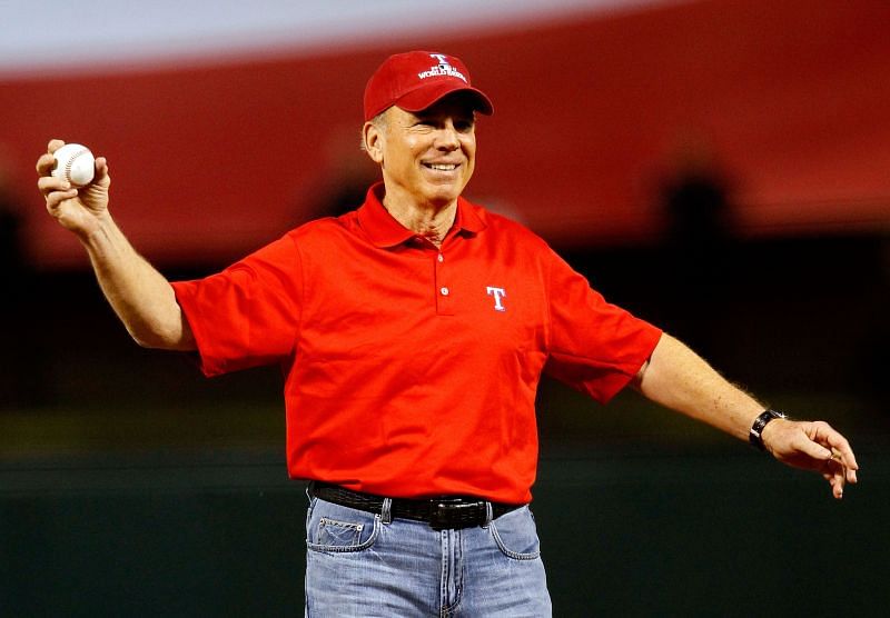 Roger Staubach throwing out a cermonial first pitch at a baseball game