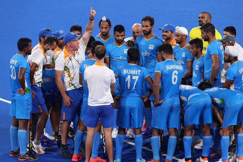Indian men&#039;s hockey team head coach Graham Reid with the players at the Tokyo Olympics.