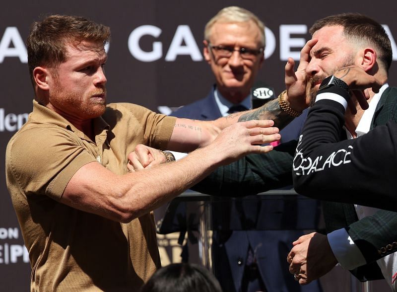 Canelo Alvarez slaps Caleb Plant during a press conference