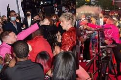 Why did Conor McGregor throw a drink at Machine Gun Kelly at the MTV Video Music Awards?