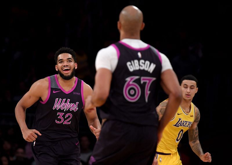 Karl-Anthony Towns #32 of the Minnesota Timberwolves celebrates a basket by Taj Gibson #67 during a 120-105 win over the Los Angeles Lakers at Staples Center on January 24, 2019 in Los Angeles, California.