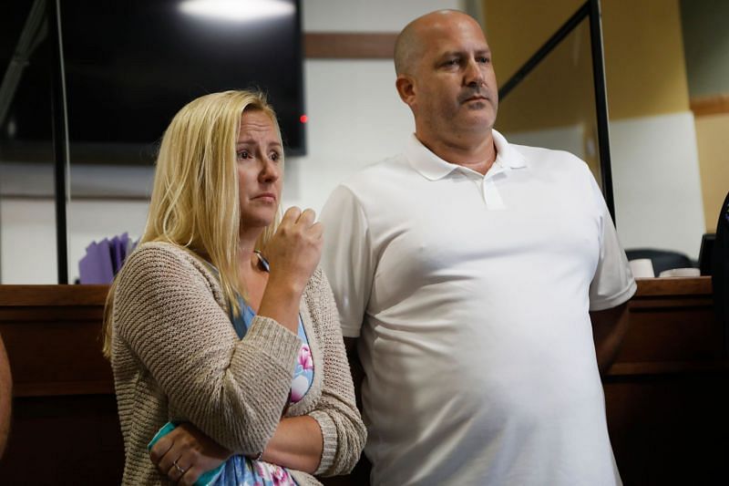 Tara Petito and Joe Petito react while the City of North Port Chief of Police Todd Garrison speaks during a news conference for their missing daughter Gabby Petito. (Image via Getty Images)