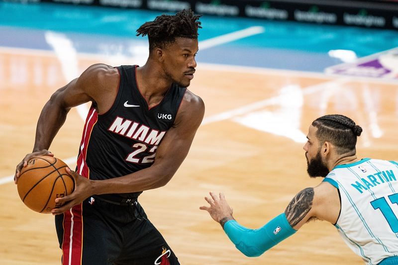 Jimmy Butler (#22) of the Miami Heat brings the ball up court.