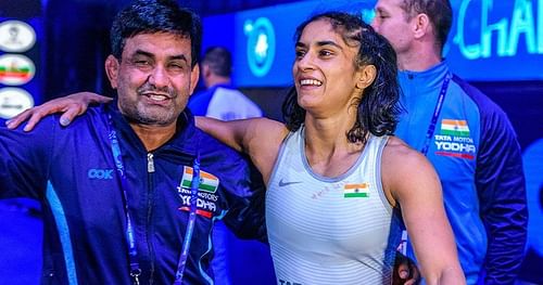 Vinesh Phogat with women's national coach Kuldeep Singh. (©UWW)