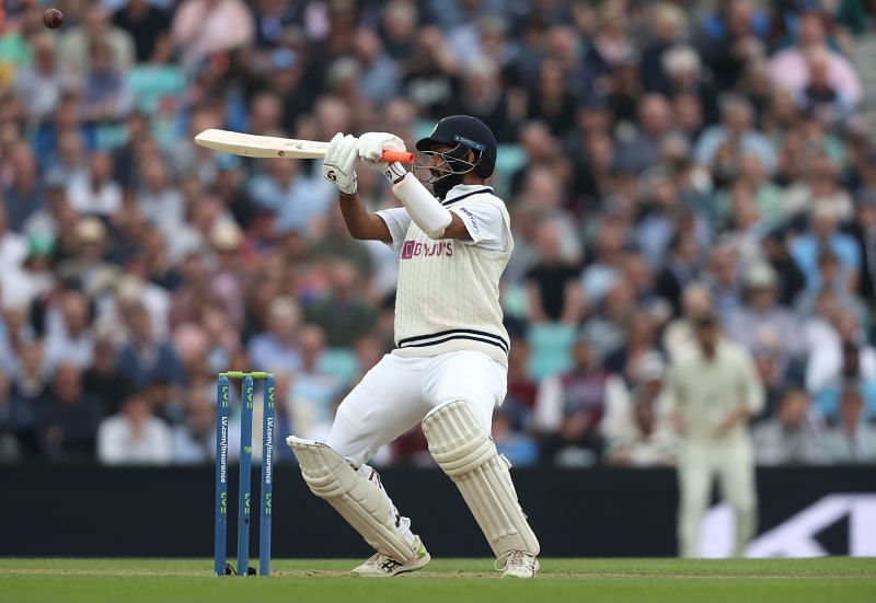 Cheteshwar Pujara scored a crucial half-century on Day 3 of The Oval Test. Pic: Getty Images