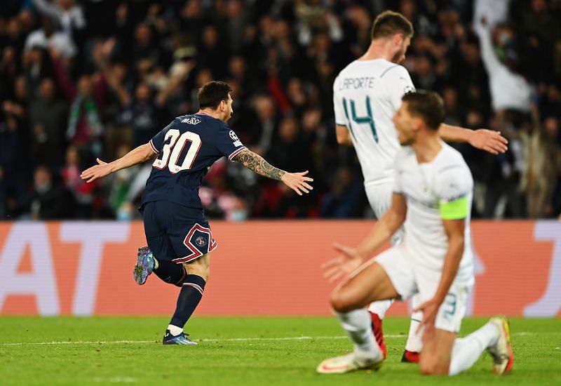 Lionel Messi (left) celebrates his goal against Manchester City.