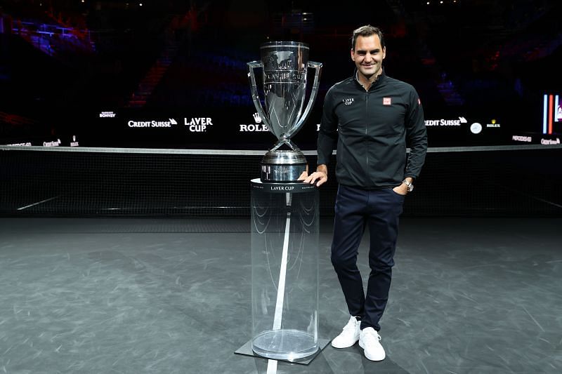 Roger Federer poses with the Laver Cup trophy