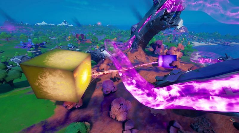 The Golden Cube is making moves across the Island near several named locations (Image via Fortnite)