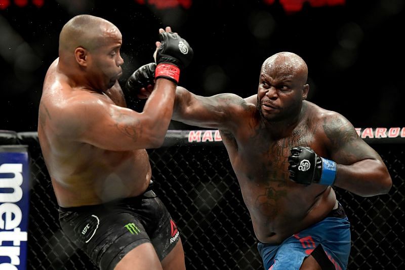 Derrick Lewis lands a cross on Daniel Cormier at UFC 230