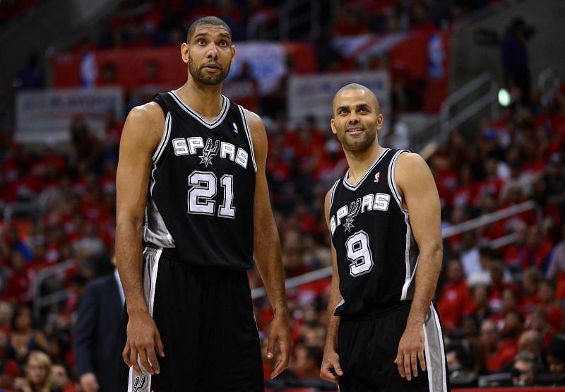 Tim Duncan #21 and Tony Parker #9 of the San Antonio Spurs