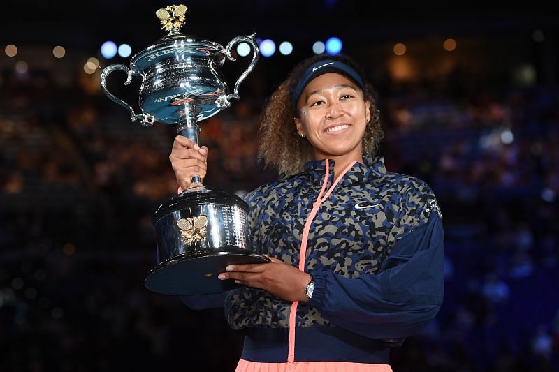 Naomi Osaka poses with the Daphne Akhurst trophy after winning the 2021 Australian Open.