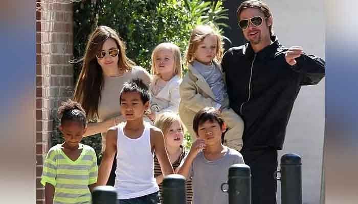 Angelina Jolie and Brad Pitt with their children (Image via Getty Images)