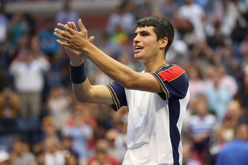 Carlos Alcaraz celebrates after beating Stefanos Tsitsipas against all odds at the 2021 US Open