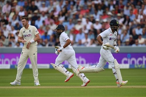 Rohit Sharma (L) and KL Rahul of India run a single as Ollie Robinson of England looks on Day 2 of The Oval Test. Pic: Getty Images