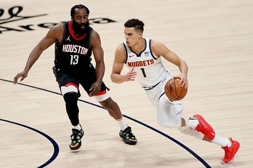 Michael Porter Jr. drives against James Harden