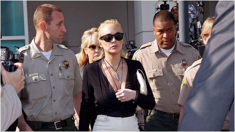 Lindsay Lohan and Dina Lohan are seen leaving the Airport Courthouse after a preliminary hearing in 2011 in Los Angeles, California. (Image via Getty Images)