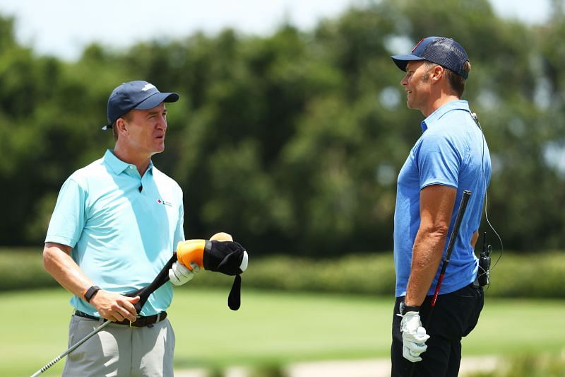 Former rivals Peyton Manning and Tom Brady talking at a charity golf tournament