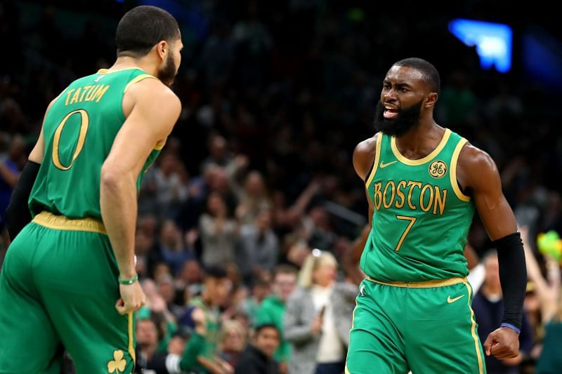 The Boston Celtics Jayson Tatum and Jaylen Brown celebrating a victory.