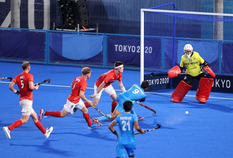 Gurjant Singh scoring a goal against Great Britain at the Olympics.
