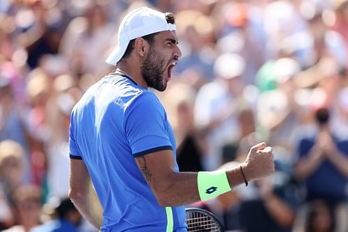 Matteo Berrettini celebrates after beating Ilya Ivashka