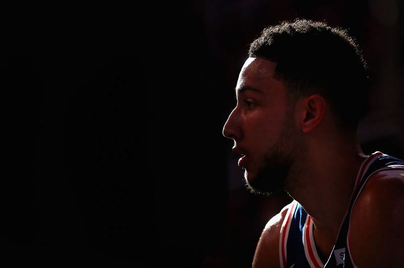 Ben Simmons watching a pre-game ceremony in a game against the Phoenix Suns.