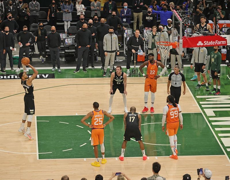 Giannis Anetokounmpo shoots a free throw against the Phoenix Suns