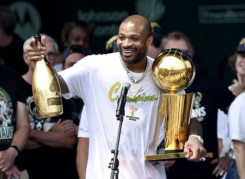  PJ Tucker celebrates with the Larry O&#039;Brien Trophy during the Milwaukee Bucks 2021 NBA Championship Victory Parade 