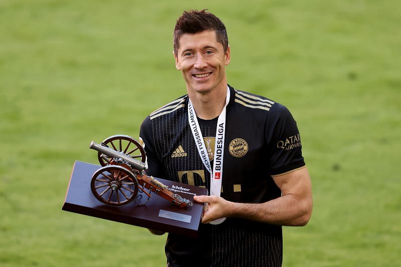 Robert Lewandowski of FC Bayern Muenchen poses with the top goalscorer of the season award