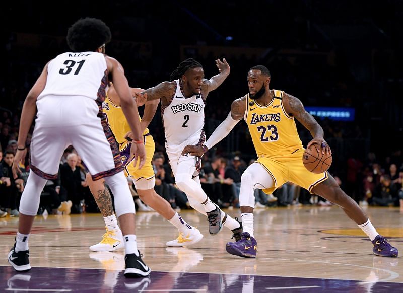 Brooklyn Nets and LA Lakers in action during an NBA game.