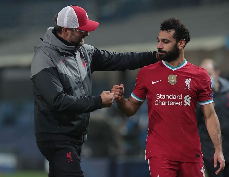 Liverpool duo of Jurgen Klopp (L) and Mohamed Salah. (Photo by Emilio Andreoli/Getty Images)