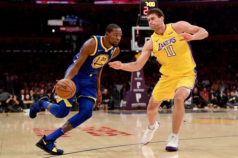 Kevin Durant drives against Brook Lopez of the LA Lakers